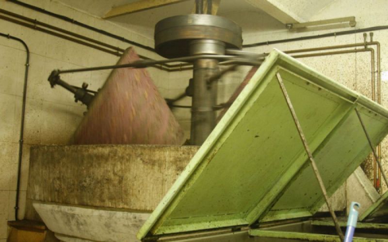 Método tradicional de prensado en molino